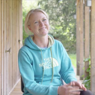 Female teacher being interviewed outdoors