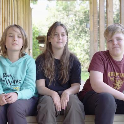 3 primary school students being interviewed 