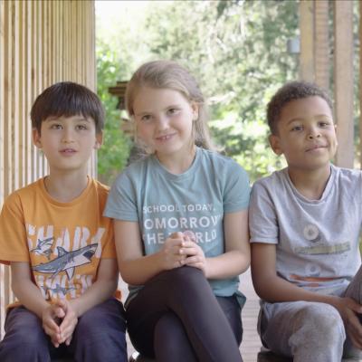 3 primary school students being interviewed 