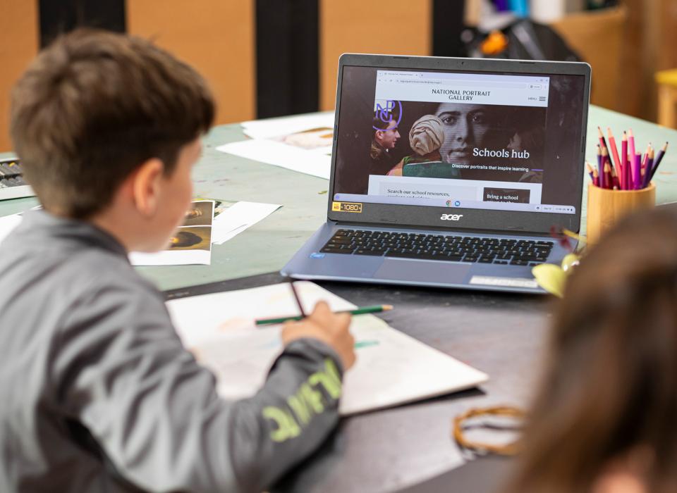 Student looking at laptop