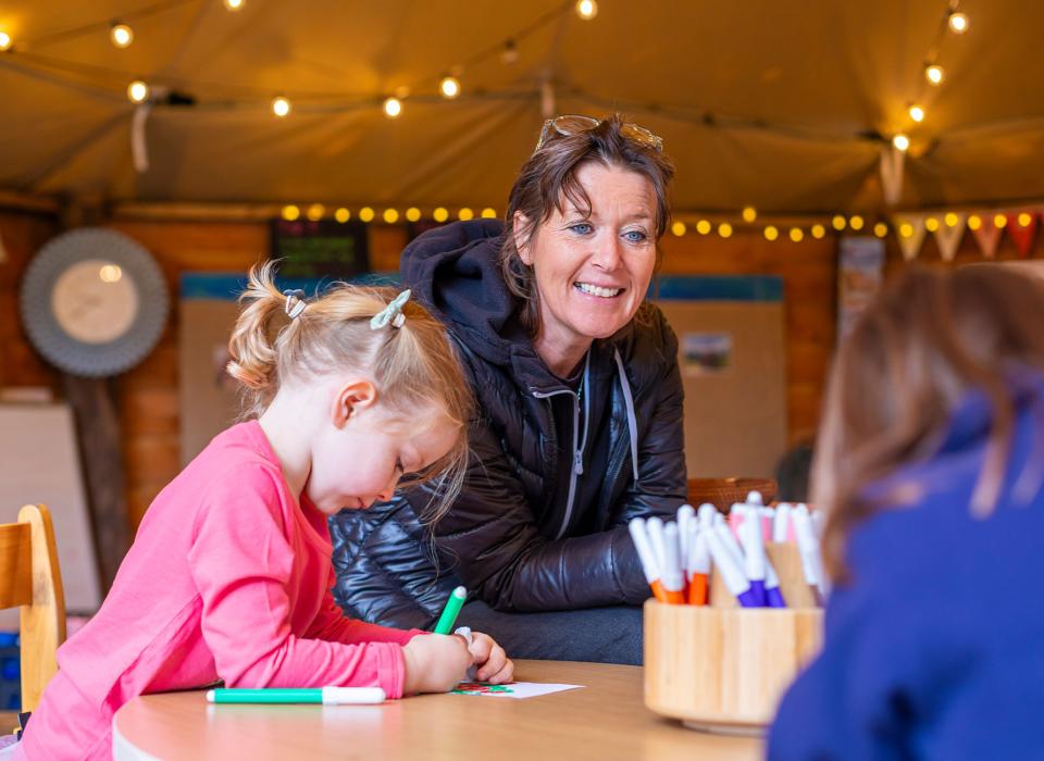 Primary teacher with students